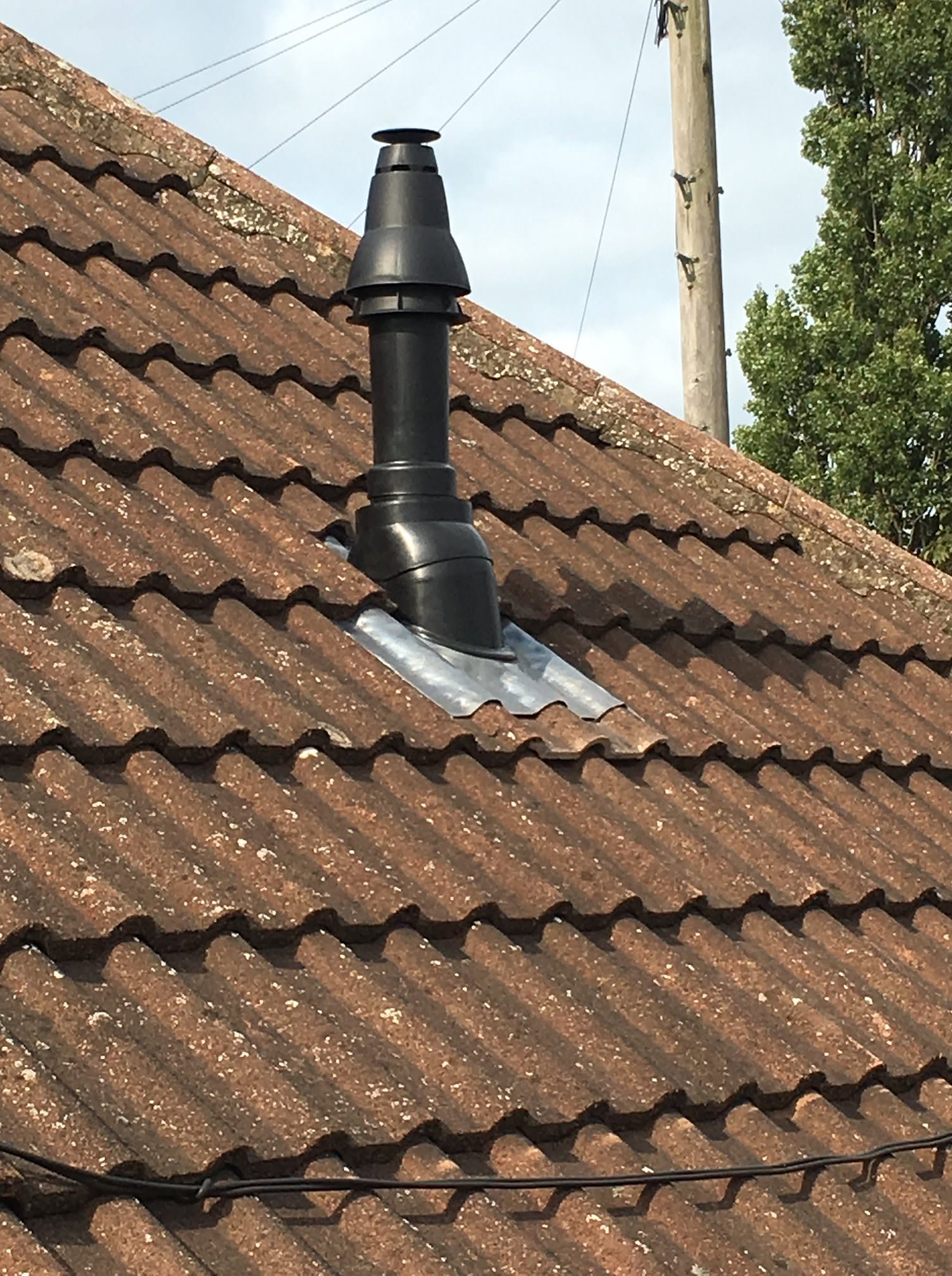 Vertical flue through roof